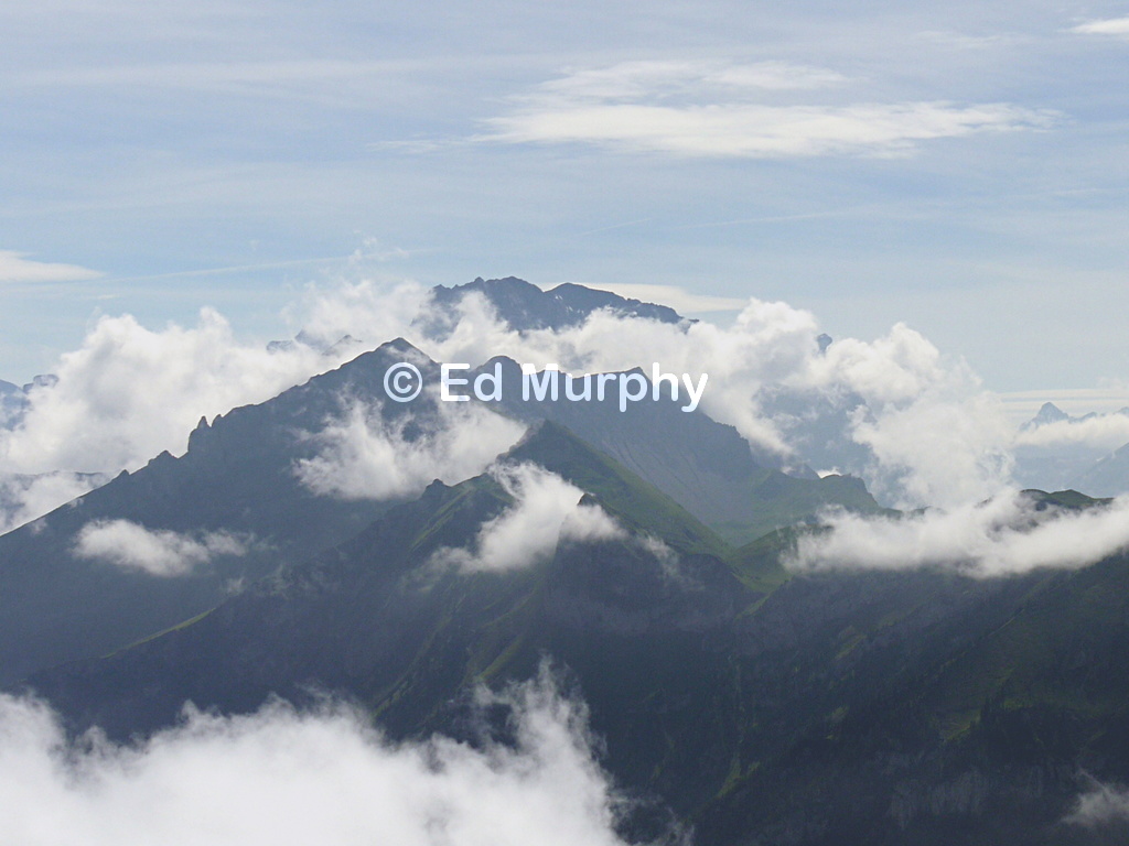 Cloud rising around the peaks between the Engstligen and Kander Valleys