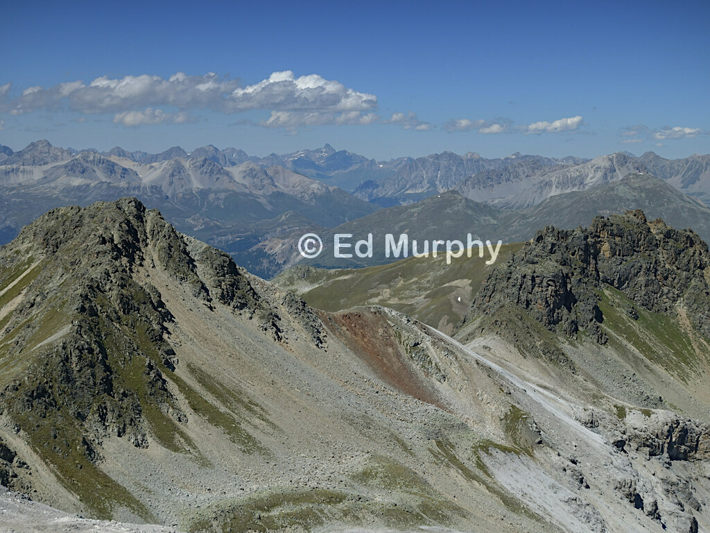 Piz Chazfor&agrave; (L) and Piz Rims (R) with the distant Fluchthorn on the horizon